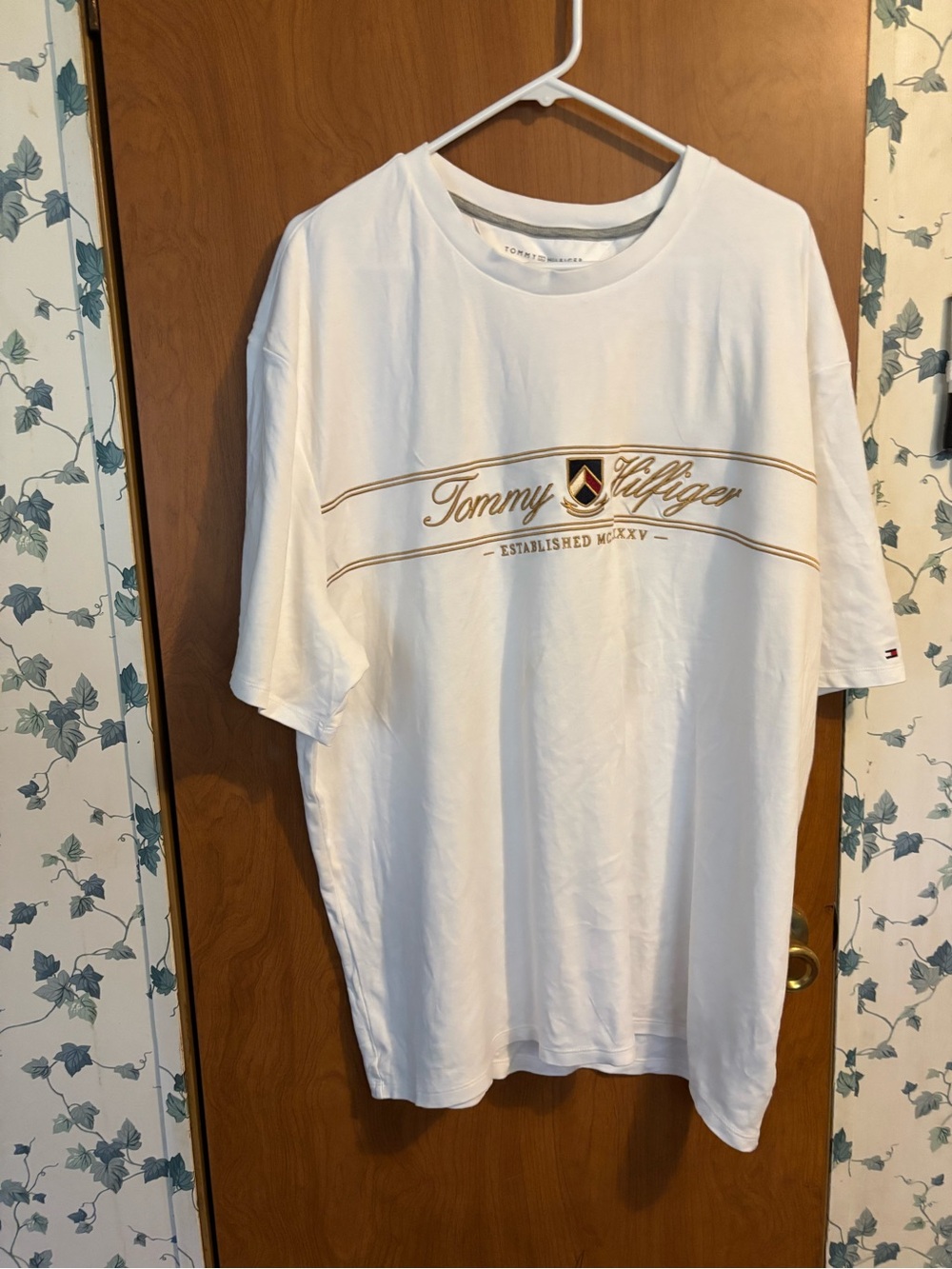 C-1 Tommy Hilfiger White Tee with Gold Script and Crest Accent